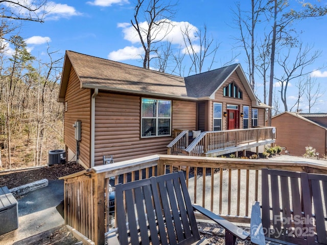 wooden deck with central AC unit