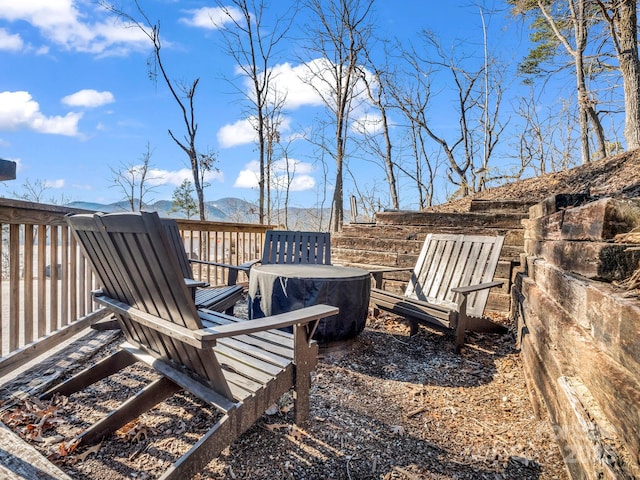 wooden terrace with a mountain view