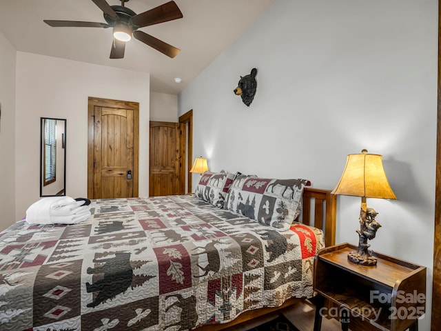 bedroom with ceiling fan and lofted ceiling