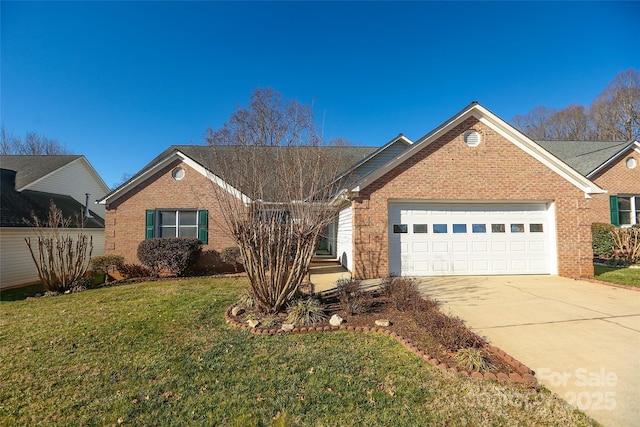 view of front of property with a front lawn and a garage