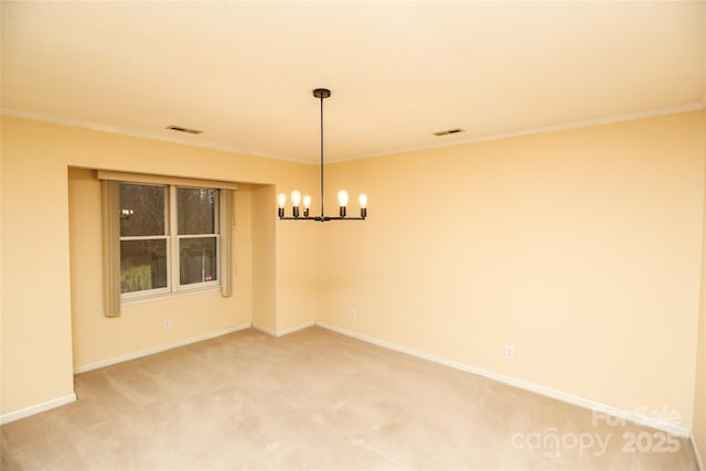 carpeted spare room featuring crown molding and a notable chandelier