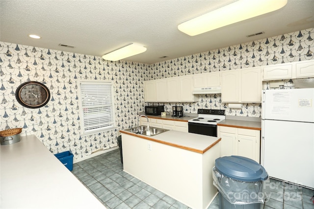 kitchen with white appliances, sink, a textured ceiling, tasteful backsplash, and white cabinetry