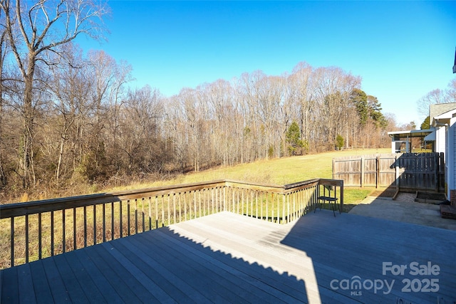 deck featuring a lawn