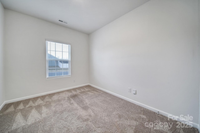 view of carpeted spare room