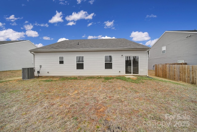 back of property featuring central AC unit