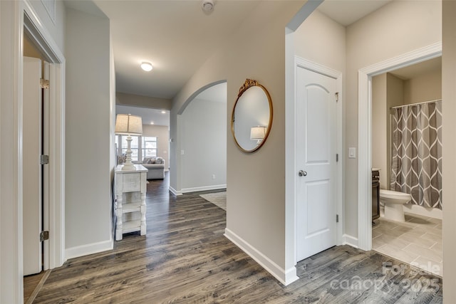 hall featuring dark hardwood / wood-style floors