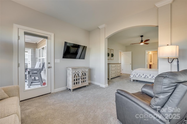 living room featuring ceiling fan and light carpet