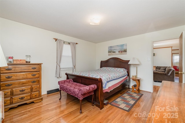 bedroom featuring light hardwood / wood-style floors