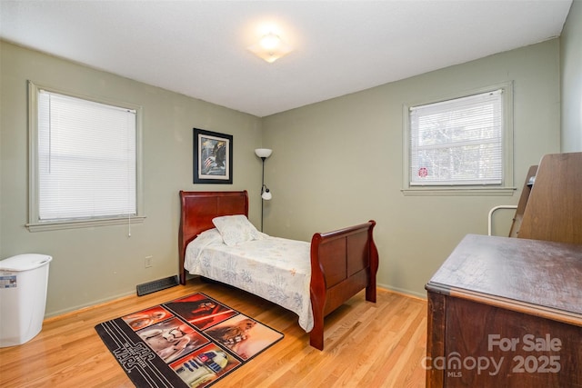 bedroom featuring light wood-type flooring