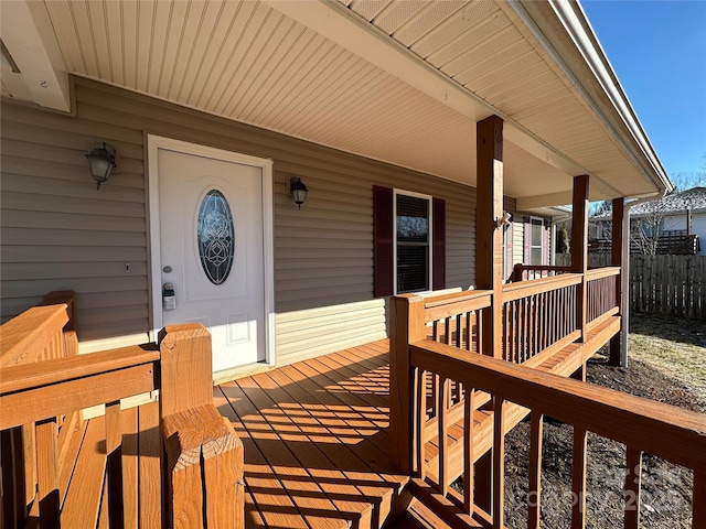 entrance to property featuring covered porch