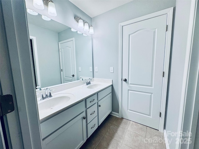 bathroom featuring vanity and tile patterned flooring