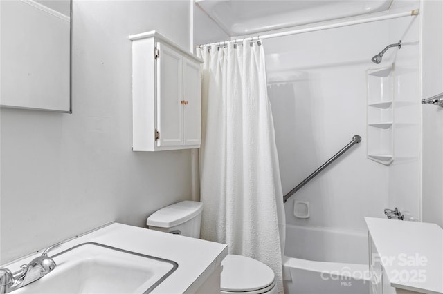 full bathroom with vanity, toilet, and shower / bath combo with shower curtain