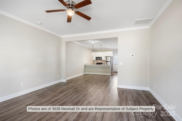 unfurnished living room featuring dark hardwood / wood-style floors, ceiling fan, and crown molding