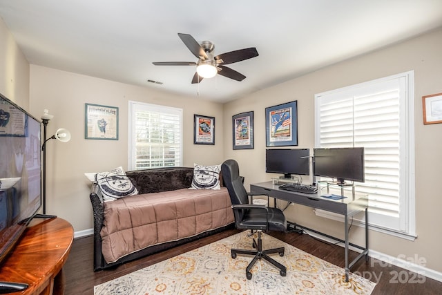 office area with dark hardwood / wood-style flooring and ceiling fan