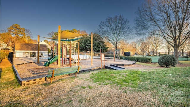 view of playground featuring a yard