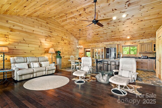 62 N Bear Cliff Dr, Nebo, NC 28761 - living area with ceiling fan, wood walls, vaulted ceiling, dark wood-style floors, and wood ceiling