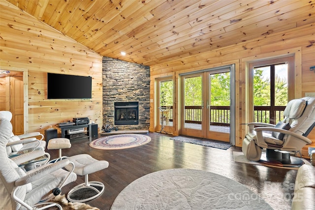 62 N Bear Cliff Dr, Nebo, NC 28761 - living area featuring wood walls, a fireplace, wooden ceiling, and hardwood / wood-style flooring