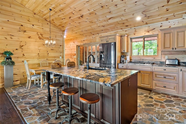 62 N Bear Cliff Dr, Nebo, NC 28761 - kitchen with stainless steel refrigerator with ice dispenser, a sink, wood ceiling, and stone flooring