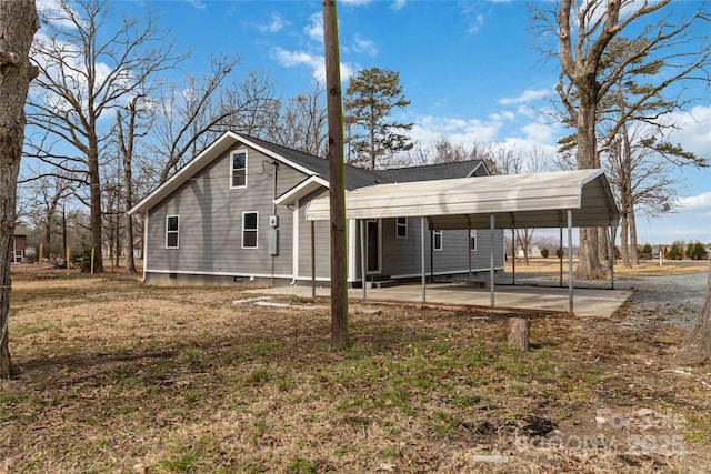 view of property exterior featuring a carport