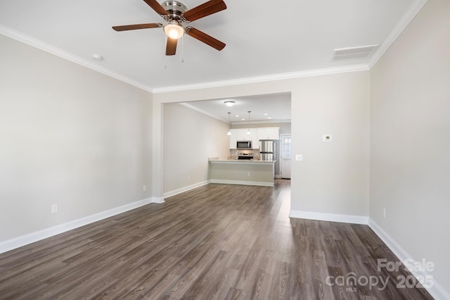 unfurnished living room featuring dark hardwood / wood-style floors, ceiling fan, and ornamental molding