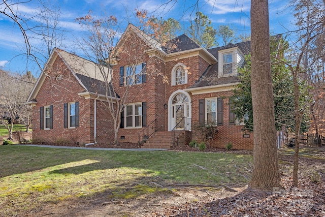 view of property featuring a front yard