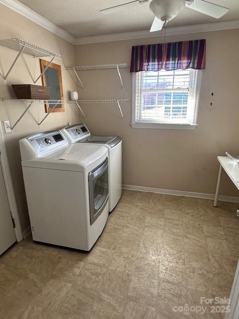 clothes washing area with ceiling fan, separate washer and dryer, and ornamental molding