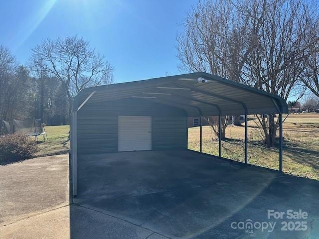 view of parking with a garage and a carport