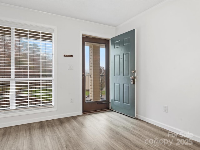 1985 Lancer Ct, Gastonia, NC 28054 - foyer with plenty of natural light, wood finished floors, ornamental molding, and baseboards