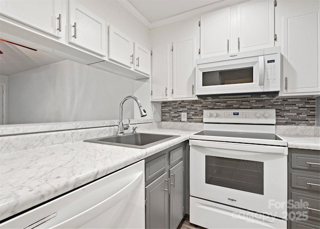 1985 Lancer Ct, Gastonia, NC 28054 - kitchen with white appliances, gray cabinetry, a sink, backsplash, and white cabinetry