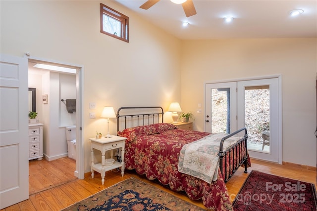 bedroom with access to exterior, light hardwood / wood-style flooring, and ceiling fan