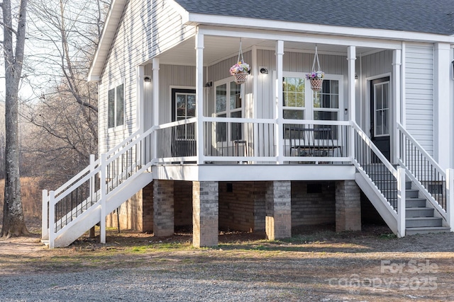 view of property exterior featuring covered porch