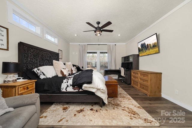 bedroom featuring ceiling fan, crown molding, and dark hardwood / wood-style floors