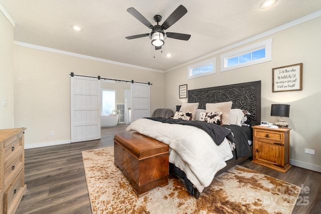 bedroom with ceiling fan, dark hardwood / wood-style flooring, ornamental molding, and a barn door