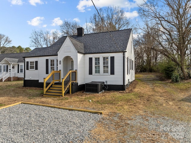 bungalow featuring central air condition unit