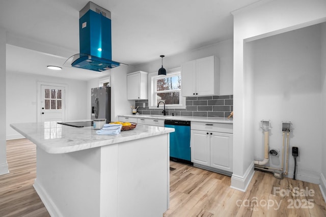 kitchen featuring a center island, sink, stainless steel appliances, white cabinets, and exhaust hood