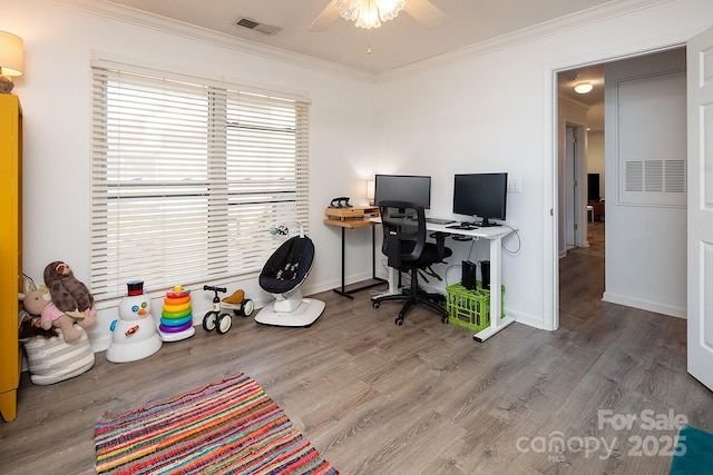 office space with ceiling fan, ornamental molding, and hardwood / wood-style floors