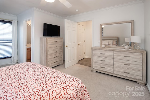 bedroom with crown molding, light colored carpet, connected bathroom, and ceiling fan