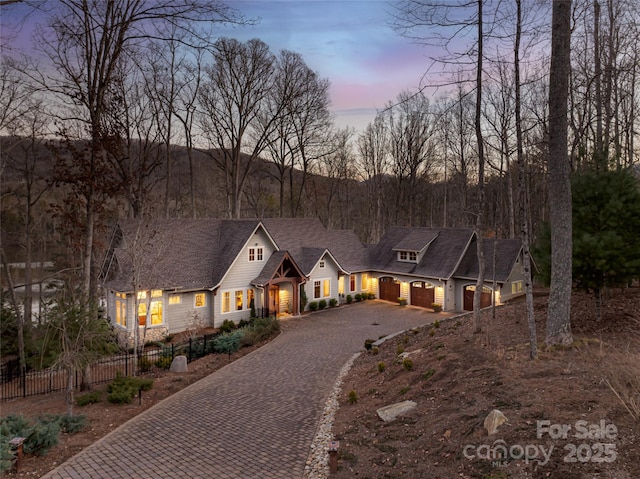 view of front of property featuring a garage