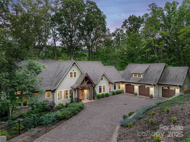 47 Twilight Sedge Dr, Biltmore Lake, NC 28715 - shingle-style home with an attached garage, decorative driveway, and a shingled roof