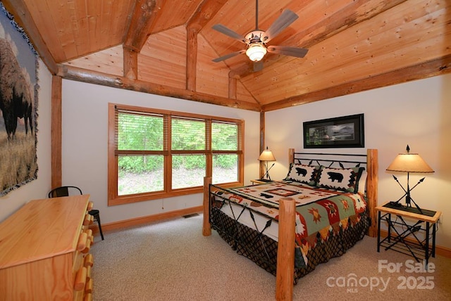 bedroom with vaulted ceiling with beams, ceiling fan, wooden ceiling, and light carpet