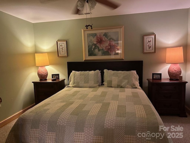 carpeted bedroom featuring ceiling fan