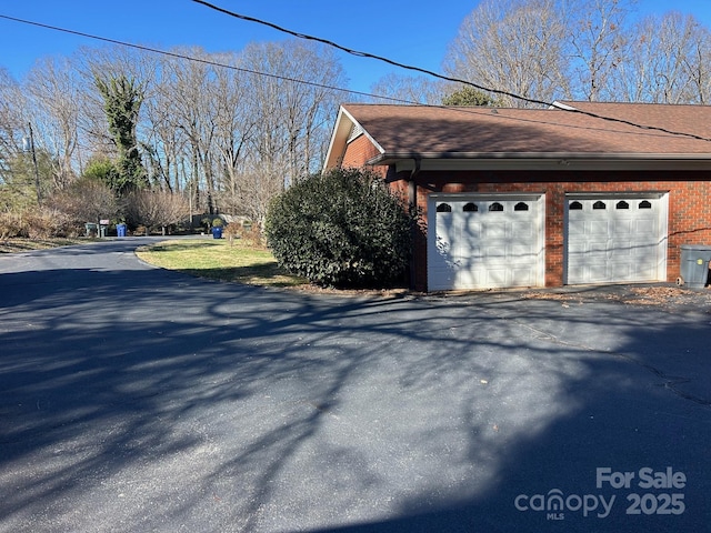 view of home's exterior featuring a garage