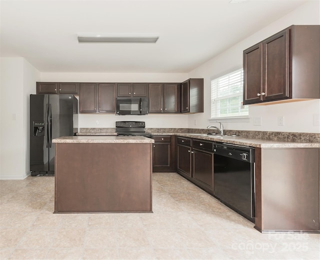 kitchen with a center island, dark brown cabinetry, black appliances, and sink