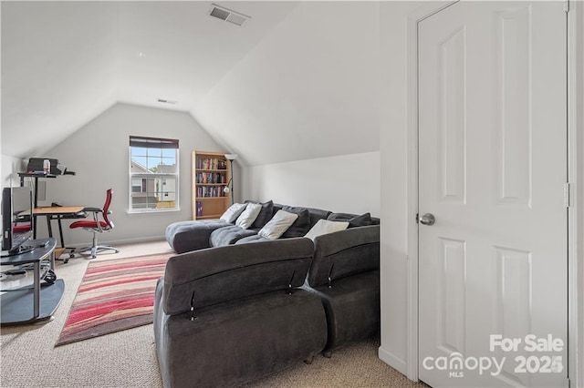 interior space featuring carpet and lofted ceiling