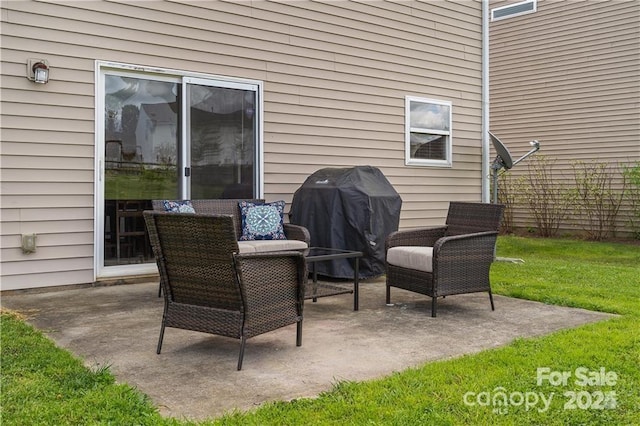 view of patio / terrace with an outdoor living space and a grill