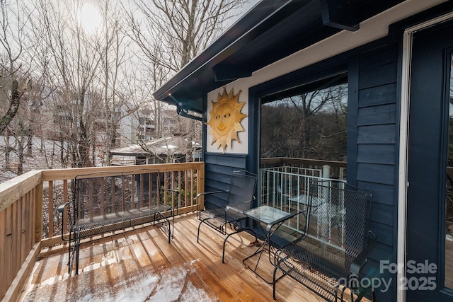 view of snow covered deck