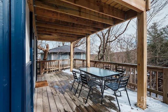 view of snow covered deck