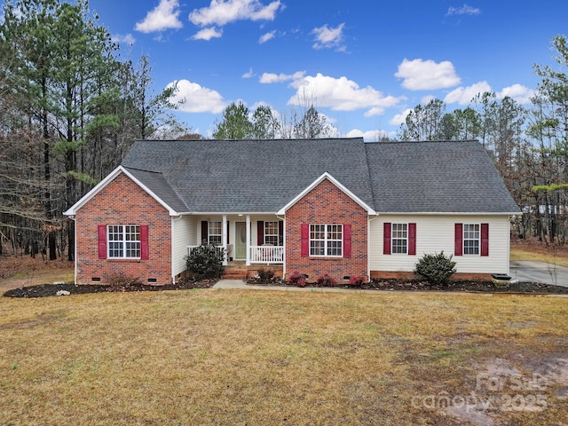 ranch-style house with a front yard and a porch