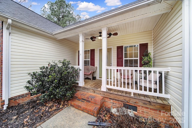 doorway to property with a porch and ceiling fan