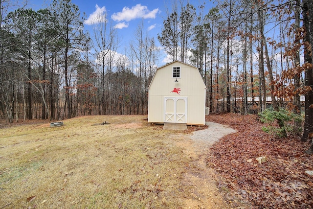 view of outdoor structure featuring a yard